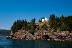 Bear Island Light Over Rock Cliffs in Acadia National Park